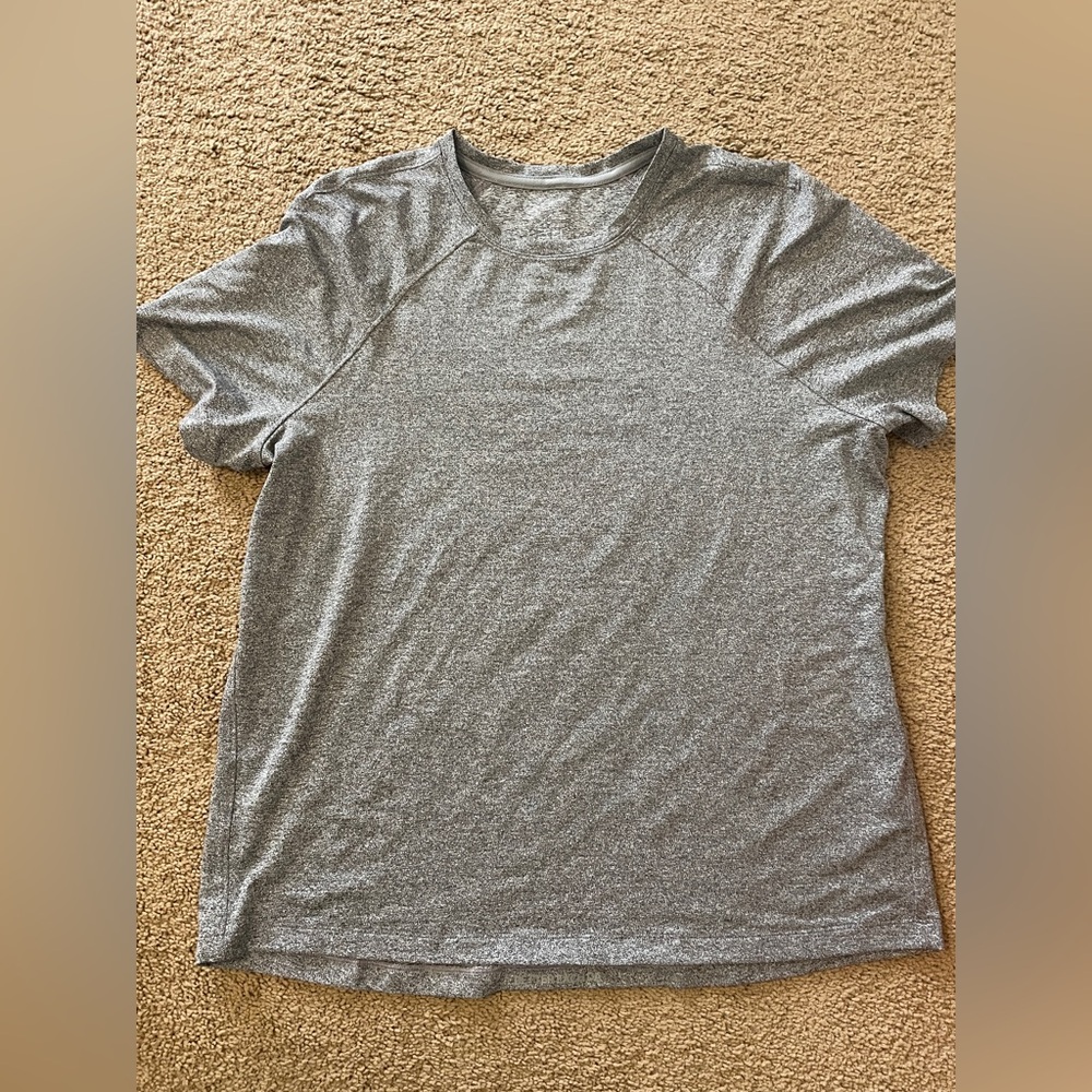 Lululemon grey short sleeved shirt. Never worn size 10